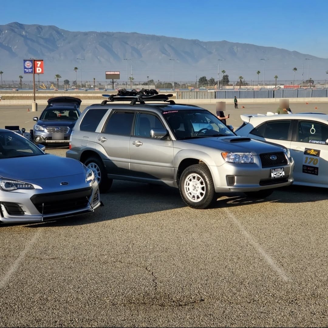 subaru forester at autocross with snowboards