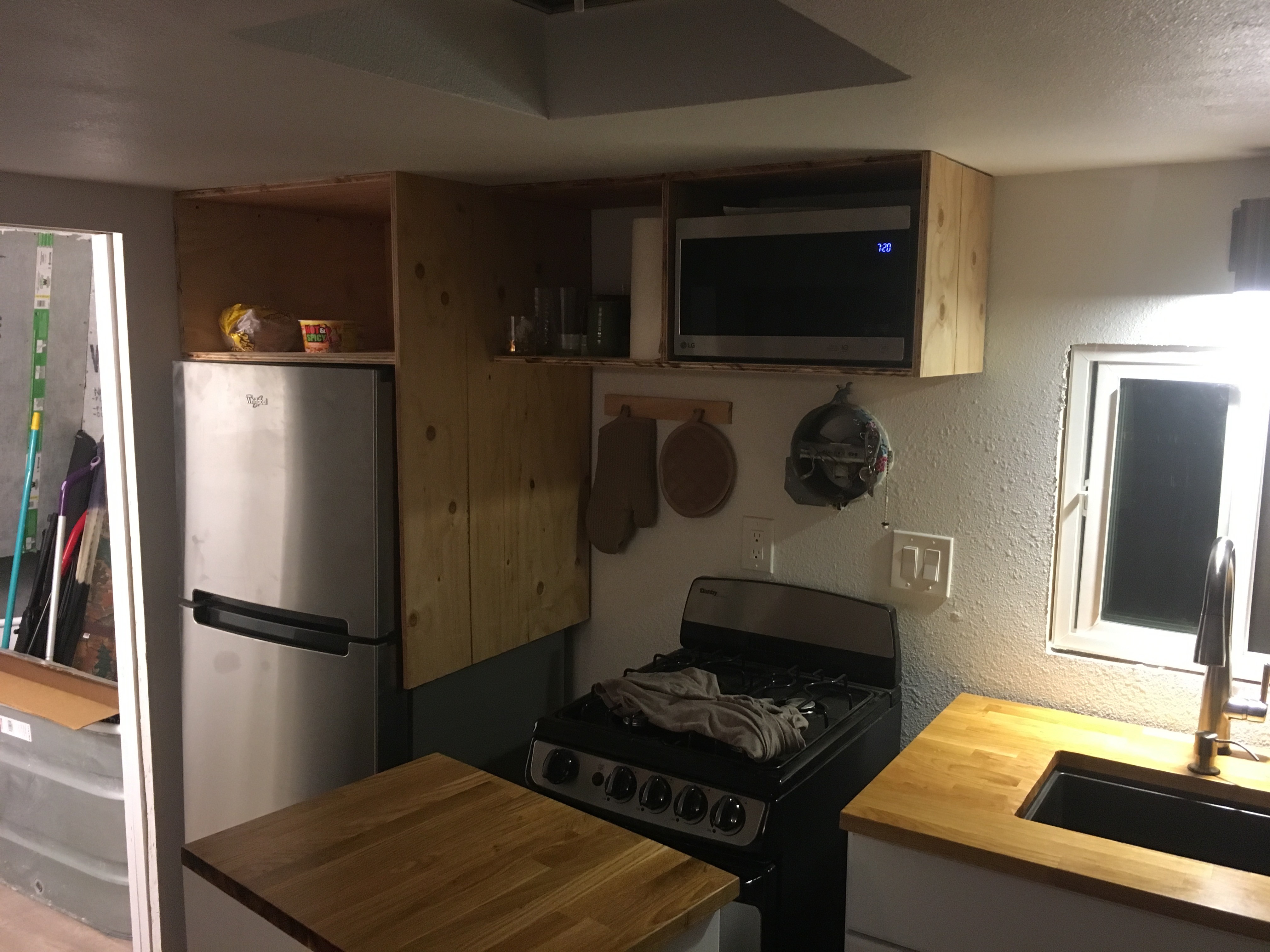 1957 trailer kitchen with brown countertops