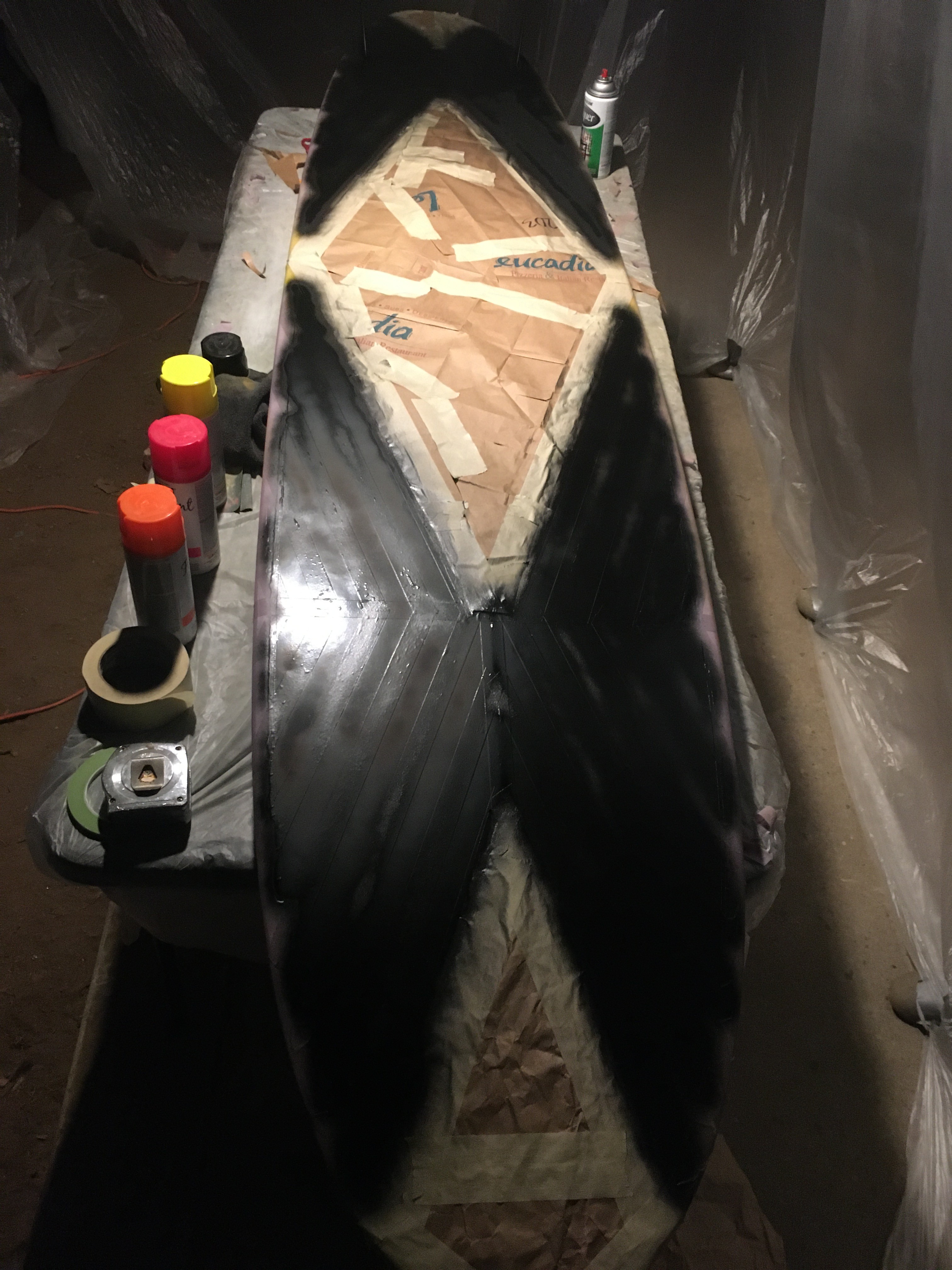 longboard surfboard painted with black