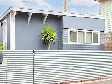 1957 Trailer Blue White Grey Fence